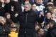 Chelsea's manager Jose Mourinho raises his arms as he watches his team play against Newcastle United during their English Premier League soccer match at Stamford Bridge, London, Saturday, Feb. 8, 2014. (AP Photo/Sang Tan)