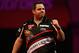 LONDON, ENGLAND - DECEMBER 28: Adrian Lewis of England celebrates winning a set during his third round match against Mervyn King of England on day thirteen of the Ladbrokes.com World Darts Championship at Alexandra Palace on December 28, 2013 in London, England. (Photo by Harry Engels/Getty Images)