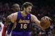 Jan 8, 2014; Houston, TX, USA; Los Angeles Lakers center Pau Gasol (16) is defended by Houston Rockets power forward Dwight Howard (12) during the fourth quarter at Toyota Center. Mandatory Credit: Andrew Richardson-USA TODAY Sports