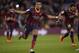 FC Barcelona's Alexis Sanchez, from Chile, reacts after scoring against Elche during a Spanish La Liga soccer match at the Camp Nou stadium in Barcelona, Spain, Sunday, Jan 5, 2014. (AP Photo/Manu Fernandez)