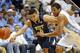 North Carolina's James Michael McAdoo (43) battles with Pittsburgh's James Robinson (0) during the first half of an NCAA college basketball game in Chapel Hill, N.C., Saturday, Feb. 15, 2014. (AP Photo/Karl B DeBlaker)