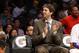 Los Angeles Lakers' Pau Gasol of Spain, who is injured, smiles on the bench against the Utah Jazz during the second half of an NBA basketball game in Los Angeles, Tuesday, Feb. 11, 2014. The Jazz won 96-79. (AP Photo/Danny Moloshok)
