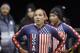 FILE - In this Oct. 25, 2013, photo, Lolo Jones, foreground, and teammate Jazmine Fenlator look up after racing in the U.S. women's bobsled team Olympic trials in Park City, Utah. Jones has gotten ill at the Sochi Olympics. Jones tweeted Monday, Feb. 10, 2014, that she was in a