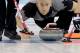 Canada's Ryan Fry releases the rock during the men's curling competition against Britain at the 2014 Winter Olympics, Saturday, Feb. 15, 2014, in Sochi, Russia. (AP Photo/Wong Maye-E)