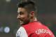 Arsenal's Olivier Giroud looks back as a goal kick is taken during their English Premier League soccer match between Arsenal and Chelsea at the Emirates stadium in London, Monday, Dec. 23, 2013. (AP Photo/Alastair Grant)