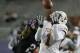 Texas wide receiver Mike Davis (1) catches a pass against TCU cornerback Jason Verrett (2) during the second half on an NCAA college football game Sunday, Oct. 27, 2013, in Fort Worth, Texas. (AP Photo/LM Otero)