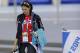Brittany Bowe of the U.S. walks with her belongings after the women's 1,500-meter speedskating race at the Adler Arena Skating Center during the 2014 Winter Olympics in Sochi, Russia, Sunday, Feb. 16, 2014. (AP Photo/Patrick Semansky)