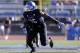 Buffalo linebacker Khalil Mack (46) runs on the field during the first half of an NCAA football game against the Connecticut on Saturday, Sept. 28, 2013, in Buffalo, N.Y. (AP Photo/Mike Groll)