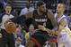 Miami Heat's LeBron James, left, drives the ball against Golden State Warriors' Stephen Curry during the second half of an NBA basketball game Wednesday, Feb. 12, 2014, in Oakland, Calif. (AP Photo/Ben Margot)