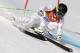 United States' Andrew Weibrecht passes a gate to win the silver medal in the men's super-G at the Sochi 2014 Winter Olympics, Sunday, Feb. 16, 2014, in Krasnaya Polyana, Russia. (AP Photo/Charles Krupa)