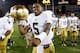 Notre Dame quarterback Everett Golson celebrates after Notre Dame defeated Southern California 22-13 in an NCAA college football game, Saturday, Nov. 24, 2012, in Los Angeles. (AP Photo/Danny Moloshok)