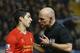Liverpool's Luis Suarez, left, speaks to referee Howard Webb during the English Premier League soccer match between Chelsea and Liverpool at Stamford Bridge Stadium in London, Sunday, Dec. 29, 2013. (AP Photo/Kirsty Wigglesworth)
