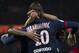 Paris Saint Germain's Zlatan Ibrahimovic, right, of Sweden celebrates with teammates after scoring against Bordeaux during their French League One soccer match, Friday Jan. 31, 2014, at Parc des Princes stadium, in Paris, France. (AP Photo/Jacques Brinon)