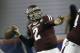 Texas A&M quarterback Johnny Manziel (2) looks for a receiver in the first half of the Chick-fil-A Bowl NCAA college football game against Duke Tuesday, Dec. 31, 2013, in Atlanta. (AP Photo/John Bazemore)