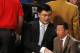 Houston Rockets' Yao Ming sits near the court during the NBA All Star basketball game, Sunday, Feb. 16, 2014, in New Orleans. (AP Photo/Bill Haber)