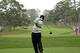 FILE - In this April 8, 2008, file photo, Toru Taniguchi of Japan tees off on the 17th hole of the Augusta National Golf Club, with the Eisenhower Tree at left, during practice for the 2008 Masters golf tournament in Augusta, Ga. The Eisenhower Tree was removed this weekend because of damage from an ice storm, the Augusta National Golf Club chairman Billy Payne said Sunday, Feb. 16, 2014. The loblolly pine was among the most famous trees in golf and it infuriated one of the club members after whom the tree eventually was named — former President Dwight D. Eisenhower. (AP Photo/David J. Phillip, File)