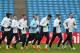 MANCHESTER, ENGLAND - FEBRUARY 17: Aleksandar Kolarov and James Milner of Manchester City lead the pack during a training session ahead of their UEFA Champions League Round of 16 match 1st leg against Barcelona at Etihad Stadium on February 17, 2014 in Manchester, England. (Photo by Clive Brunskill/Getty Images)