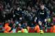 Manchester United's Wayne Rooney, right, takes the ball forward with teammate Robin Van Persie during their English Premier League soccer match between Arsenal and Manchester United at the Emirates stadium in London, Wednesday, Feb. 12, 2014. (AP Photo/Alastair Grant)