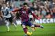 FC Barcelona's Lionel Messi, from Argentina, kicks the ball and scores from a penalty during a Spanish La Liga soccer match against Valencia, at the Camp Nou stadium in Barcelona, Spain, Saturday, Feb. 1, 2014. (AP Photo/Manu Fernandez)