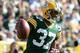 GREEN BAY, WI - OCTOBER 06: Sam Shields #37 of the Green Bay Packers reacts as he is called for a penalty during the game against the Detroit Lions at Lambeau Field on October 6, 2013 in Green Bay, Wisconsin. (Photo by Harry How/Getty Images)