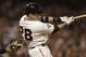 San Francisco Giants' Buster Posey swings for an RBI single off Colorado Rockies' Jeff Manship in the fourth inning of a baseball game Tuesday, Sept. 10, 2013, in San Francisco. (AP Photo/Ben Margot)