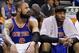 New York Knicks center Tyson Chandler (6) and forward Carmelo Anthony (7) are pictured on the bench late in the fourth quarter of an NBA basketball game against the Oklahoma City Thunder in Oklahoma City, Sunday, Feb. 9, 2014. Oklahoma City won 112-100. (AP Photo/Sue Ogrocki)