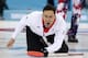 Britain’s skip David Murdoch shouts instructions after delivering the stone during a tiebreaker game against Norway in men's curling competition against at the 2014 Winter Olympics, Tuesday, Feb. 18, 2014, in Sochi, Russia. (AP Photo/Robert F. Bukaty)