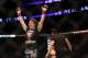 Sara McMann celebrates her win over Sheila Gaff after their UFC 159 Mixed Martial Arts bout in Newark, NJ, Saturday, April 27,2013. McMann won via first round TKO. (AP Photo/Gregory Payan)