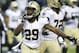 New Orleans Saints running back Khiry Robinson (29) celebrates after running for a 1-yard touchdown during the fourth quarter of an NFC divisional playoff NFL football game against the Seattle Seahawks in Seattle, Saturday, Jan. 11, 2014. (AP Photo/Ted S. Warren)