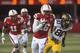 Nebraska's Stanley Jean-Baptiste (16) runs for a touchdown after intercepting a pass from Minnesota quarterback Philip Nelson which bounced off of Minnesota's Devin Crawford-Tufts (80), in the second half of an NCAA college football game in Lincoln, Neb., Saturday, Nov. 17, 2012. Nebraska won 38-14. At left is Nebraska's Andrew Green. (AP Photo/Dave Weaver)
