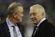 Dallas Cowboys owner Jerry Jones, left, talks with his son Stephen Jones, the team's executive vice president, before an NFL football game, Sunday, Dec. 29, 2013, in Arlington, Texas. (AP Photo/Tim Sharp)