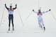 SOCHI, RUSSIA - FEBRUARY 18: Martin Fourcade of France stretches for the finish line next to Emil Hegle Svendsen of Norway during the Men's 15 km Mass Start during day 11 of the Sochi 2014 Winter Olympics at Laura Cross-country Ski & Biathlon Center on February 18, 2014 in Sochi, Russia. (Photo by Harry How/Getty Images)