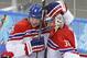 Czech Republic defenseman Ladislav Smid celebrates their 5-3 win over Slovakia with goaltender Ondrej Pavelec, right, after the 2014 Winter Olympics men's ice hockey game at Shayba Arena, Tuesday, Feb. 18, 2014, in Sochi, Russia. (AP Photo/Petr David Josek)