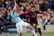 Manchester City's Jesus Navas, left, tackles Barcelona's Jordi Alba during their Champions League last-16 round soccer match at the Etihad Stadium in Manchester, England, Tuesday, Feb. 18, 2014. (AP Photo/Clint Hughes)