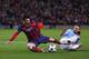 MANCHESTER, ENGLAND - FEBRUARY 18: Martin Demichelis of Manchester City fouls Lionel Messi of Barcelona to concede a penalty and is subsequently sent off during the UEFA Champions League Round of 16 first leg match between Manchester City and Barcelona at the Etihad Stadium on February 18, 2014 in Manchester, England. (Photo by Clive Brunskill/Getty Images)