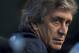 Manchester City manager Manuel Pellegrini waits to answer questions during a press conference at the Etihad Stadium, Manchester, England, Monday Feb. 17, 2014. Manchester City will play Barcelona on Tuesday in a Champions League first knock out round soccer match. (AP Photo/Jon Super)