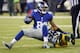 New York Giants' Hakeem Nicks (88) is tackled by Green Bay Packers' Tramon Williams (38) during the first half of an NFL football game Sunday, Nov. 17, 2013, in East Rutherford, N.J. (AP Photo/Bill Kostroun)