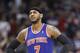 New York Knicks forward Carmelo Anthony (7) shows his disappointment in the closing seconds of an NBA basketball game against the Memphis Grizzlies, Tuesday, Feb. 18, 2014, in Memphis, Tenn. The Grizzlies won 98-93. (AP Photo/Lance Murphey)