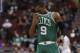 Boston Celtics' Rajon Rondo wipes his jersey on his face during the first half of an NBA basketball game against the Philadelphia 76ers, Wednesday, Feb. 5, 2014, in Philadelphia. The Celtics won 114-108. (AP Photo/Chris Szagola)