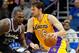 Jan 24, 2014; Orlando, FL, USA; Los Angeles Lakers center Pau Gasol (16) drives to the basket as Orlando Magic power forward Glen Davis (11) defends during the second half at Amway Center. Orlando Magic defeated the Los Angeles Lakers 114-105. Mandatory Credit: Kim Klement-USA TODAY Sports