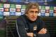 MANCHESTER, ENGLAND - FEBRUARY 17: Manchester City manager Manuel Pellegrini and midfielder Yaya Toure listen to questions from the media during a press conference after a training session ahead of their UEFA Champions League Round of 16 match 1st leg against Barcelona at Etihad Stadium on February 17, 2014 in Manchester, England. (Photo by Clive Brunskill/Getty Images)