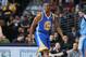 Golden State Warriors forward Harrison Barnes takes court against the Denver Nuggets in the first quarter of an NBA basketball game in Denver on Monday, Dec. 23, 2013. (AP Photo/David Zalubowski)