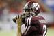 Texas A&M quarterback Johnny Manziel (2) warms up before the start of the Chick-fil-A Bowl NCAA college football game against Duke Tuesday, Dec. 31, 2013, in Atlanta. (AP Photo/John Bazemore)