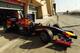 BAHRAIN, BAHRAIN - FEBRUARY 19: Sebastian Vettel of Germany and Infiniti Red Bull Racing exits his garage to drive during day one of Formula One Winter Testing at the Bahrain International Circuit on February 19, 2014 in Bahrain, Bahrain. (Photo by Ker Robertson/Getty Images)