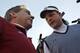 Alabama head coach Nick Saban, left, talks with Auburn head coach Gus Malzahn prior to the start of an NCAA college football game in Auburn, Ala., Saturday, Nov. 30, 2013. (AP Photo/Butch Dill)