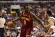 Feb 18, 2014; Philadelphia, PA, USA; Cleveland Cavaliers forward Luol Deng (9) is defended by Philadelphia 76ers guard Evan Turner (12) during the first quarter at the Wells Fargo Center. Mandatory Credit: Howard Smith-USA TODAY Sports