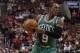Boston Celtics' Rajon Rondo in action during the first half of an NBA basketball game against the Philadelphia 76ers, Wednesday, Feb. 5, 2014, in Philadelphia. The Celtics won 114-108. (AP Photo/Chris Szagola)
