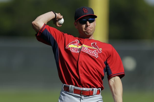 Bernie: Cutting through the deep grass in center field : Sports