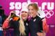 SOCHI, RUSSIA - FEBRUARY 19: Kaillie Humphries and Heather Moyse (R) of Canada team 1 celebrate after winning the gold medal during the Women's Bobsleigh on Day 12 of the Sochi 2014 Winter Olympics at Sliding Center Sanki on February 19, 2014 in Sochi, Russia. (Photo by Al Bello/Getty Images)