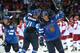 SOCHI, RUSSIA - FEBRUARY 19: Mikael Granlund #64, Ossi Vaananen #4 and Teemu Selanne #8 of Finland celebrate after defeating Russia 3-1 during the Men's Ice Hockey Quarterfinal Playoff on Day 12 of the 2014 Sochi Winter Olympics at Bolshoy Ice Dome on February 19, 2014 in Sochi, Russia. (Photo by Bruce Bennett/Getty Images)